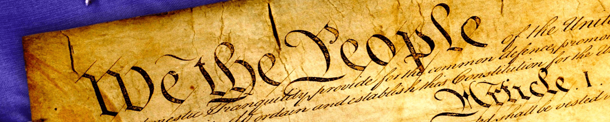up close of the top of the U.S. constitution - We the People